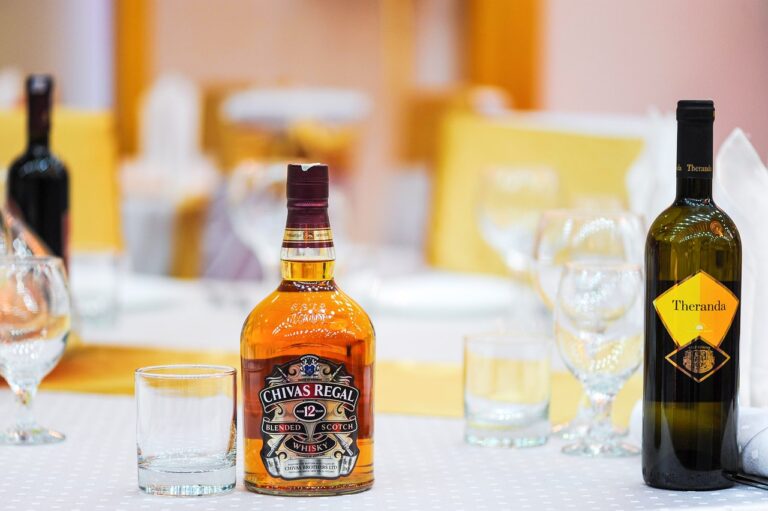 Whisky glass and bottle for a guide to fine whiskies