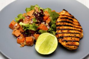 Grilled chicken quinoa salad plate for quick summer weeknight meals