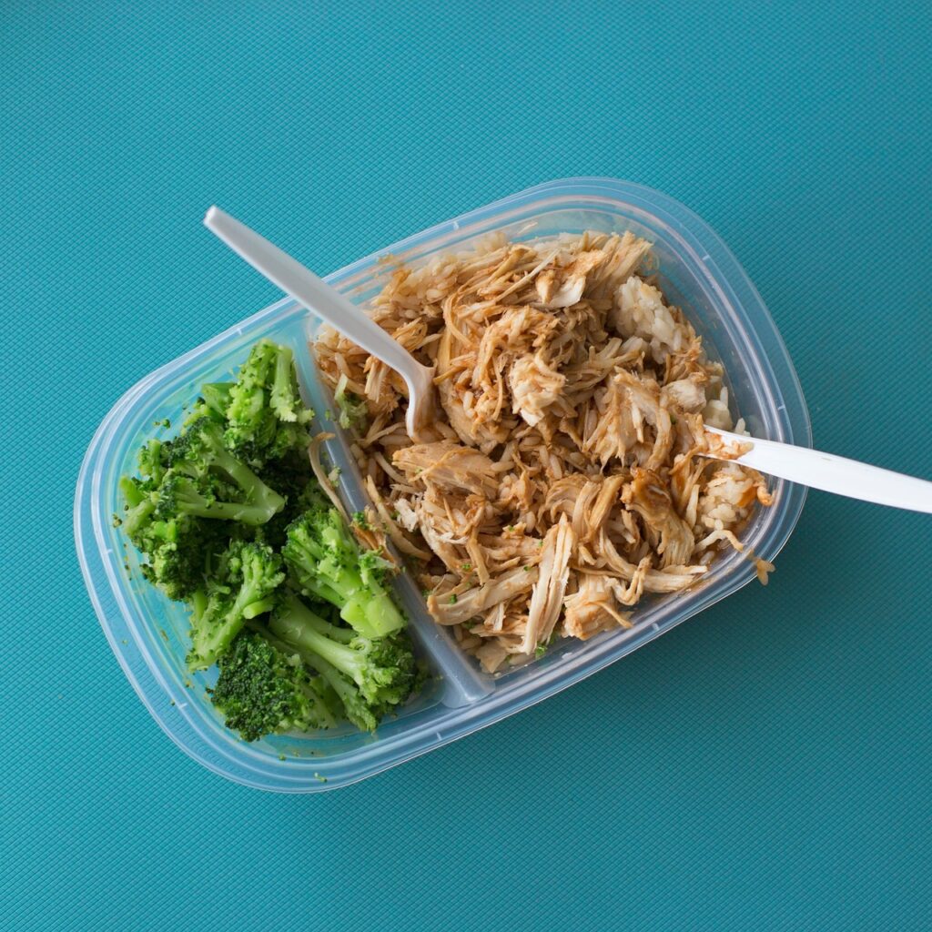 Prepared packed lunch with rice, vegetables and protein for meal prep