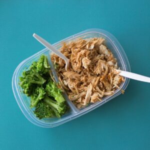 Prepared packed lunch with rice, vegetables and protein for meal prep