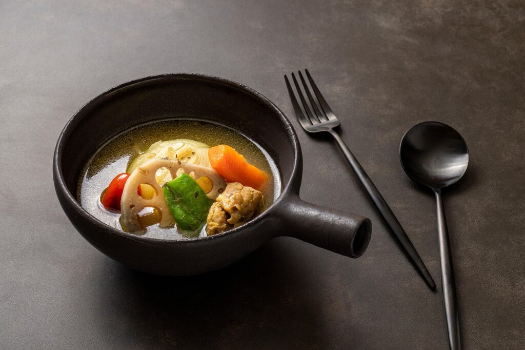 Hearty root vegetable soup served in a bowl